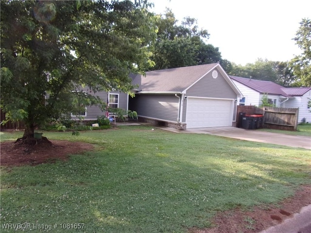 818 N 3rd St, Ozark, AR 72949 - view of front of home featuring a garage, concrete driveway, and brick siding