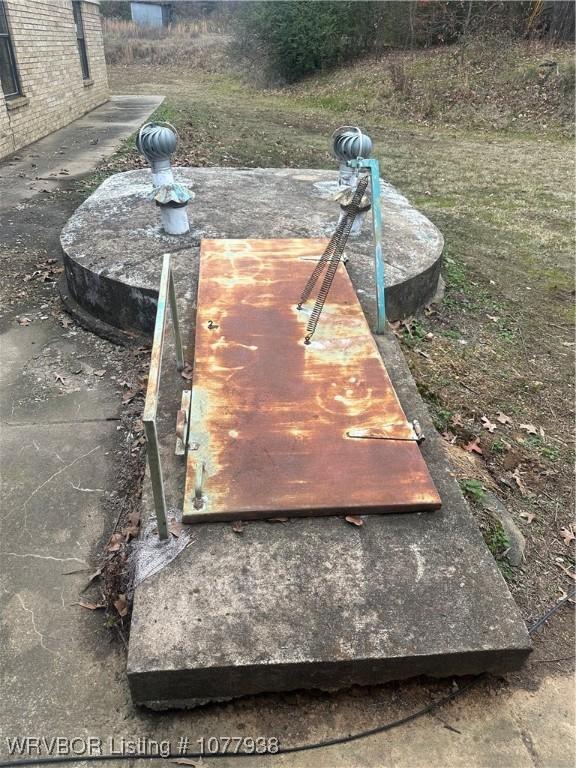 view of entry to storm shelter