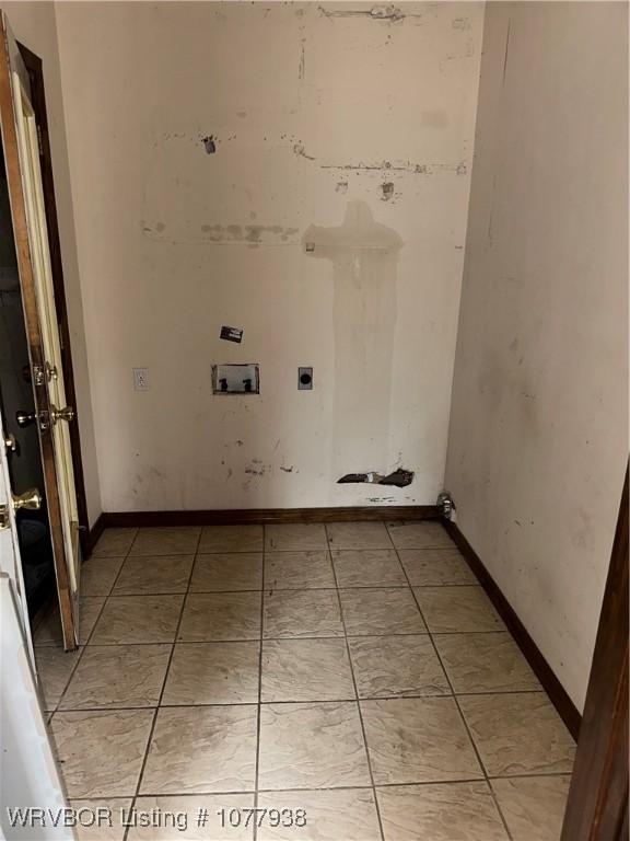 laundry room featuring hookup for an electric dryer and washer hookup