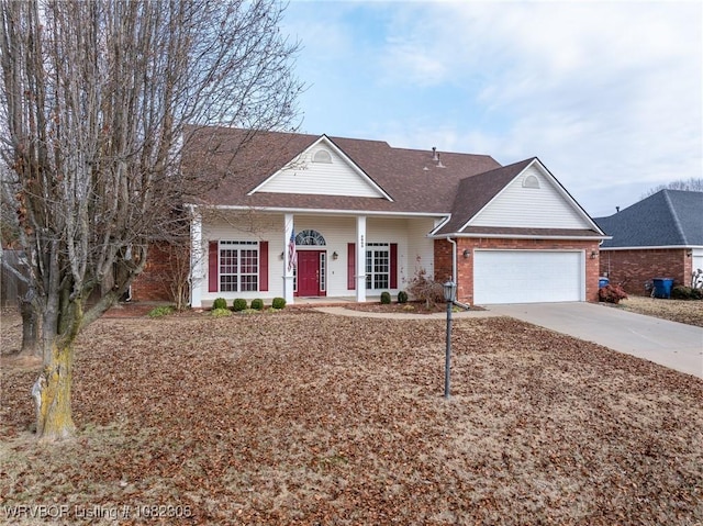 5805 Meadow Brook Dr, Fort Smith, AR 72916 - view of front of home with a garage, concrete driveway, brick siding, roof with shingles, and a porch
