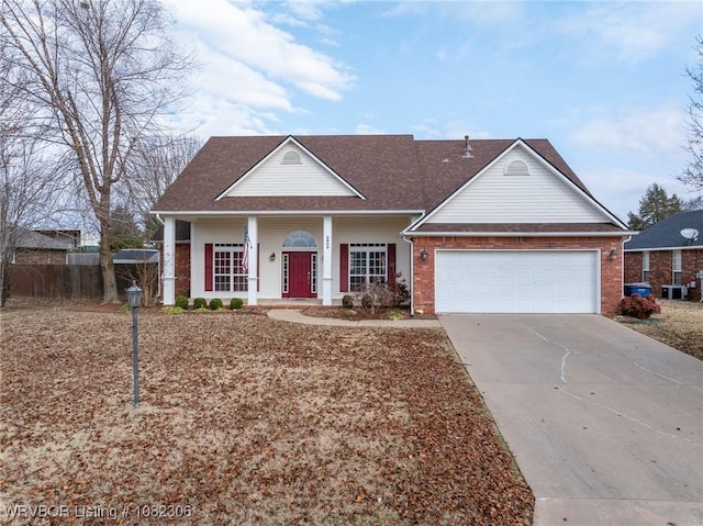 5805 Meadow Brook Dr, Fort Smith, AR 72916 - view of front facade featuring a garage, concrete driveway, and brick siding