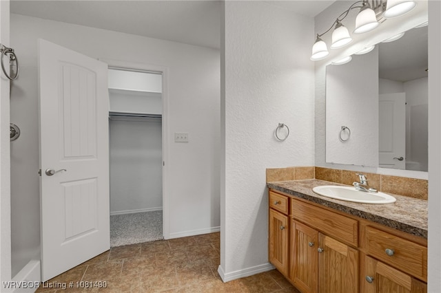 8601 Corona Ct, Uniontown, AR 72955 - full bathroom featuring vanity and baseboards