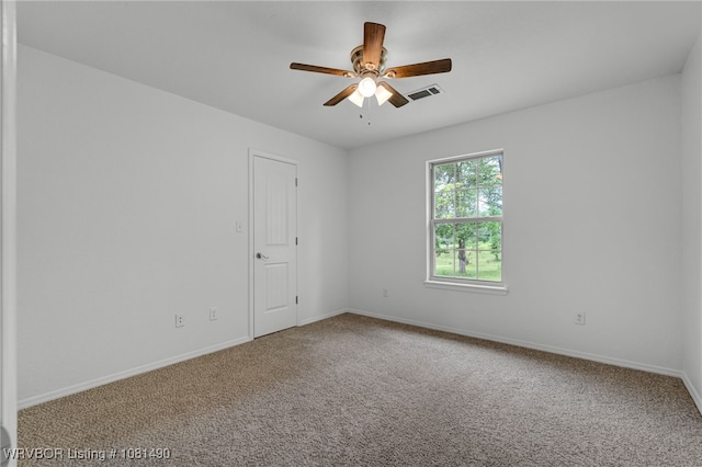 8601 Corona Ct, Uniontown, AR 72955 - carpeted spare room featuring ceiling fan and baseboards