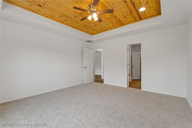 8601 Corona Ct, Uniontown, AR 72955 - carpeted empty room featuring a raised ceiling, wooden ceiling, a ceiling fan, baseboards, and recessed lighting
