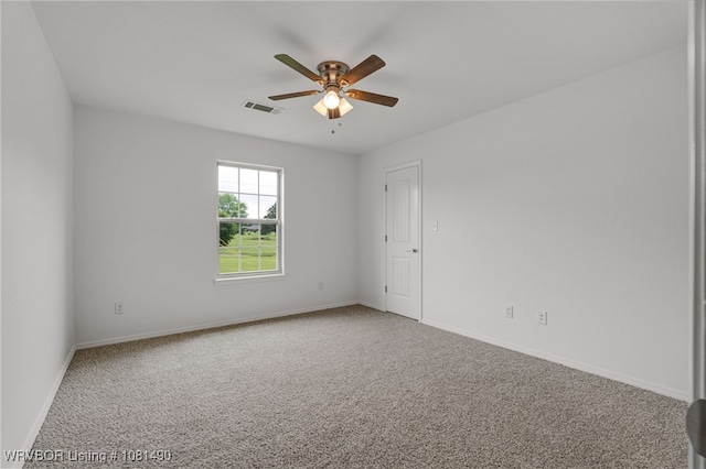 8601 Corona Ct, Uniontown, AR 72955 - unfurnished room with carpet, ceiling fan, and baseboards