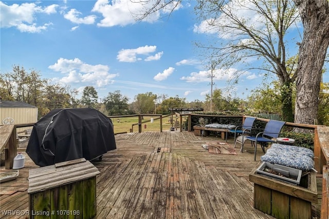 wooden terrace with grilling area