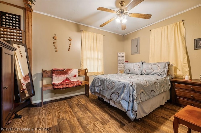 bedroom featuring electric panel, ceiling fan, crown molding, and hardwood / wood-style flooring