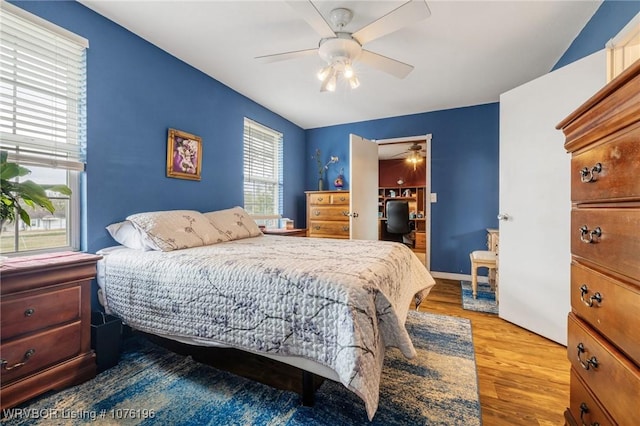 bedroom featuring ceiling fan and light hardwood / wood-style floors