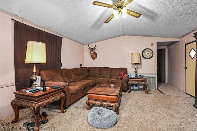 carpeted living room with ceiling fan, ornamental molding, a textured ceiling, and vaulted ceiling