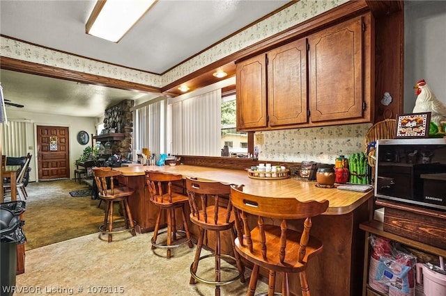 kitchen with light colored carpet