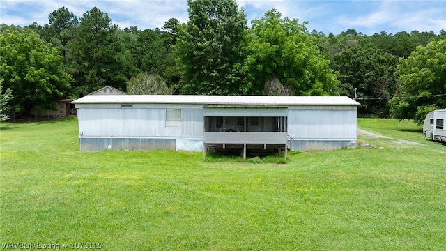 view of outdoor structure featuring a yard