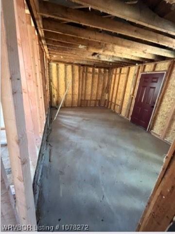 misc room with concrete flooring