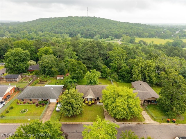 drone / aerial view of a heavily wooded area