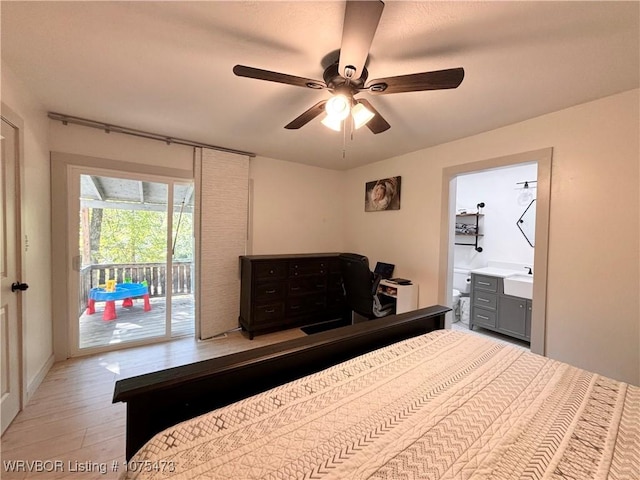 bedroom with ceiling fan, light wood-type flooring, access to outside, and connected bathroom