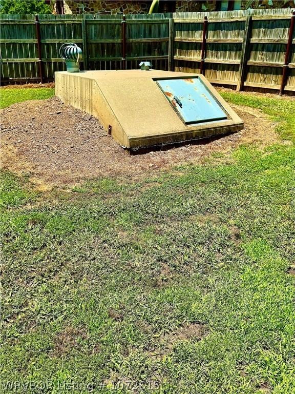 entry to storm shelter with a yard