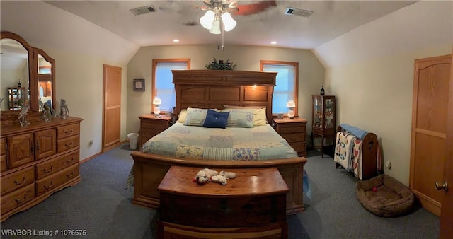 carpeted bedroom with ceiling fan and vaulted ceiling