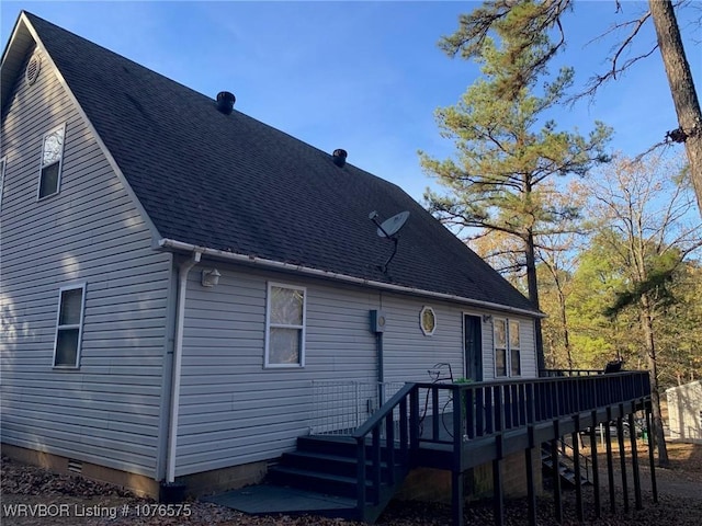 rear view of property with a deck