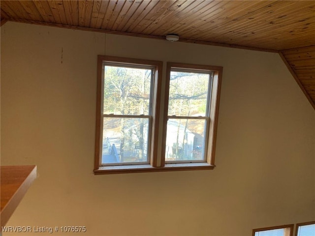 bonus room featuring lofted ceiling and wooden ceiling