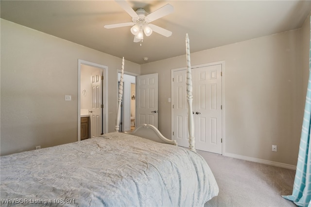carpeted bedroom with baseboards and a ceiling fan