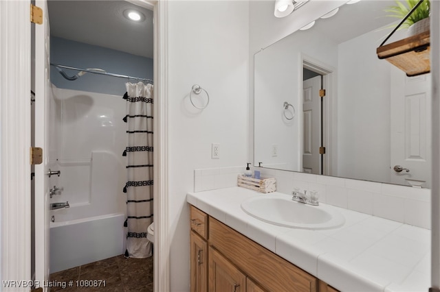 full bath with toilet, vanity, shower / bathtub combination with curtain, and tile patterned flooring