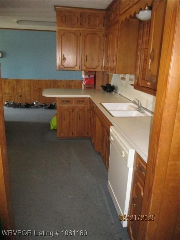 1501 18th St, Ozark, AR 72949 - kitchen with a sink, white dishwasher, light countertops, and carpet flooring