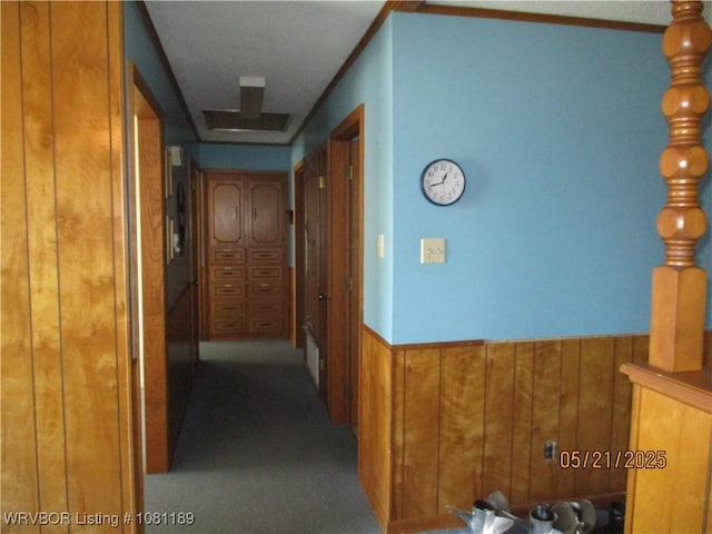 1501 18th St, Ozark, AR 72949 - corridor with wooden walls and a wainscoted wall
