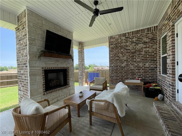 9121 Wayne Xing, Fort Smith, AR 72916 - fenced backyard with a patio, a ceiling fan, and an outdoor living space with a fireplace