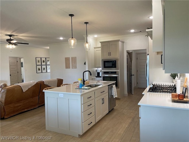 9121 Wayne Xing, Fort Smith, AR 72916 - kitchen with stainless steel appliances, open floor plan, a sink, light countertops, and crown molding
