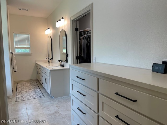 9121 Wayne Xing, Fort Smith, AR 72916 - bathroom featuring double vanity and a spacious closet