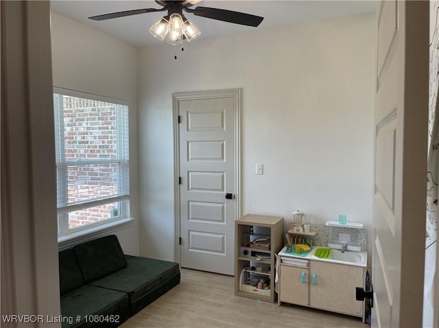 9121 Wayne Xing, Fort Smith, AR 72916 - living area with a ceiling fan and light wood-style flooring