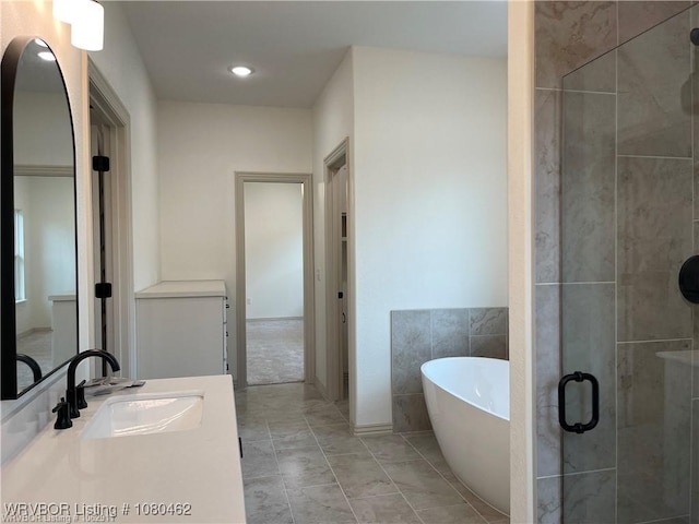 9121 Wayne Xing, Fort Smith, AR 72916 - full bath with a freestanding tub, a shower stall, and vanity