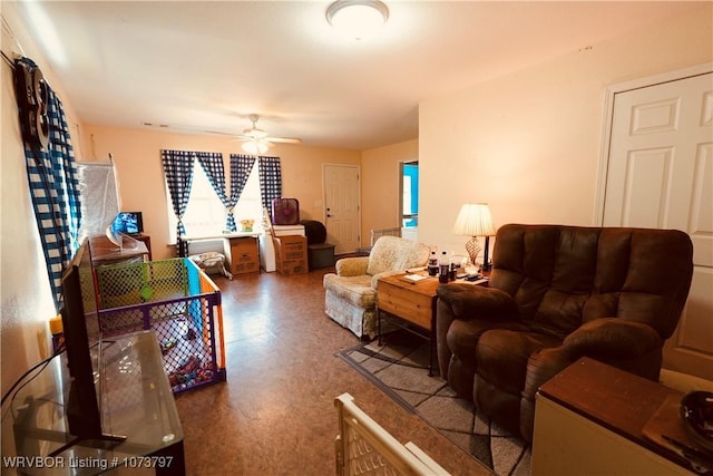 living room featuring ceiling fan