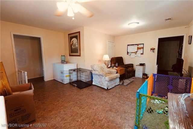 living room with ceiling fan