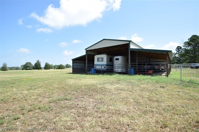 view of outdoor structure featuring a rural view