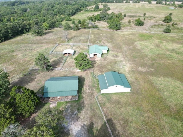 birds eye view of property featuring a rural view