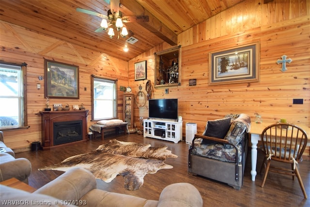 living room with dark hardwood / wood-style flooring, lofted ceiling with beams, ceiling fan, and wood ceiling