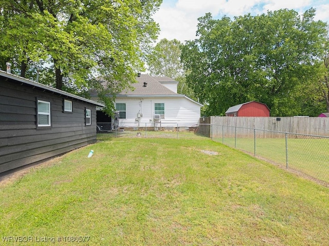 301 Choctaw St, Hackett, AR 72937 - view of yard with a fenced backyard and an outbuilding