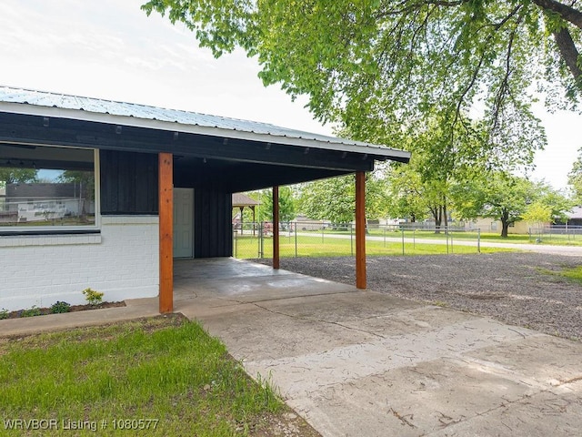 301 Choctaw St, Hackett, AR 72937 - exterior space featuring fence, concrete driveway, and an attached carport