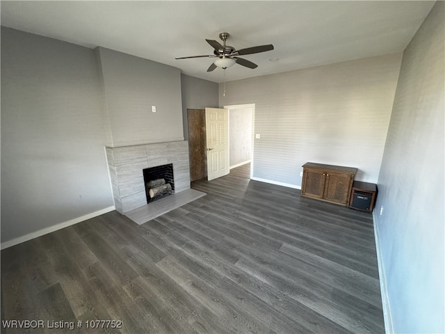 1216 N 13th St, Fort Smith, AR 72901 - unfurnished living room with ceiling fan, a fireplace, and dark hardwood / wood-style floors