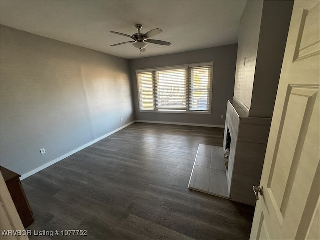 1216 N 13th St, Fort Smith, AR 72901 - unfurnished living room with dark hardwood / wood-style floors and ceiling fan
