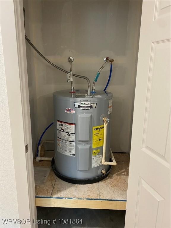 4223 High St, Fort Smith, AR 72904 - utility room featuring water heater