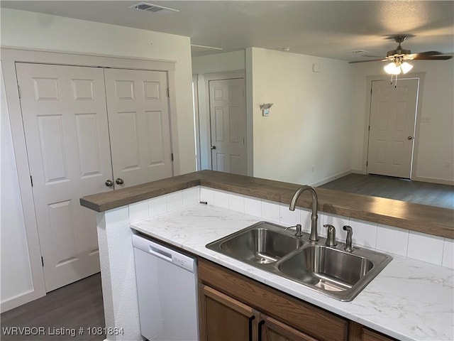 4223 High St, Fort Smith, AR 72904 - kitchen featuring dishwasher, dark wood-style flooring, ceiling fan, and brown cabinets