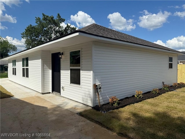 4223 High St, Fort Smith, AR 72904 - view of property exterior with a patio and a lawn