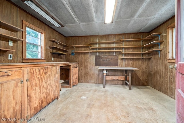 2017 S 70th St, Fort Smith, AR 72903 - miscellaneous room featuring wood walls and unfinished concrete floors