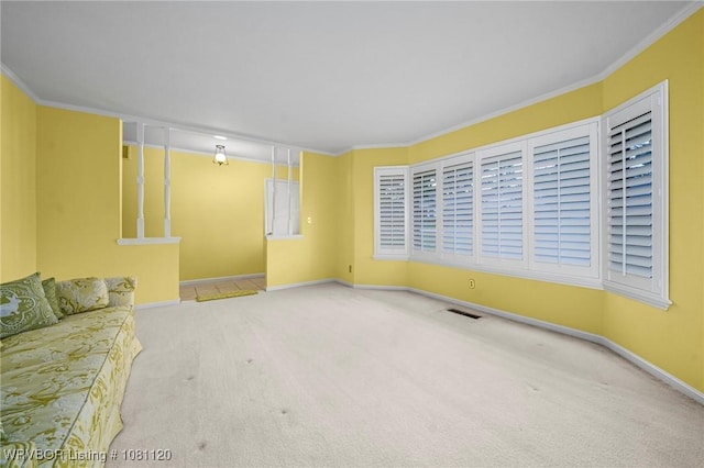 2017 S 70th St, Fort Smith, AR 72903 - unfurnished living room with carpet floors, crown molding, and baseboards