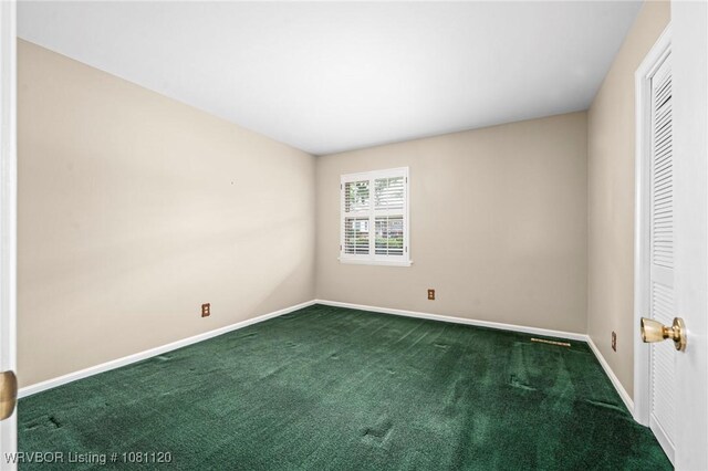 2017 S 70th St, Fort Smith, AR 72903 - spare room featuring baseboards and carpet