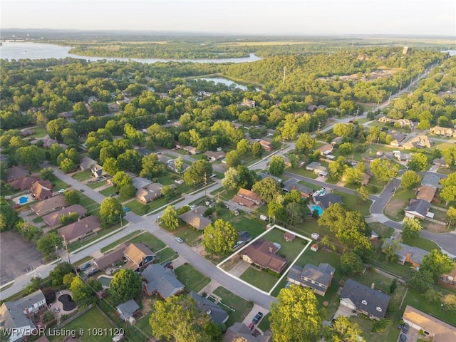2017 S 70th St, Fort Smith, AR 72903 - aerial view of property's location featuring a nearby body of water, property parcel outlined, and nearby suburban area
