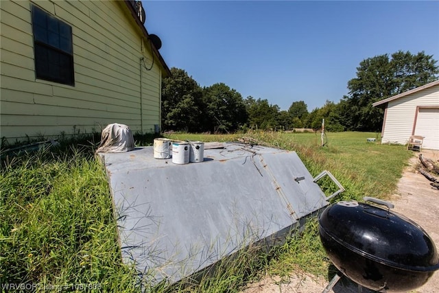 entry to storm shelter with a yard