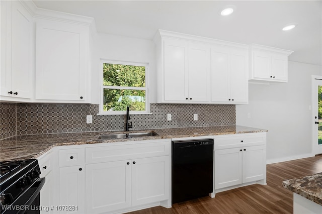 kitchen featuring black appliances, white cabinetry, sink, and stone counters