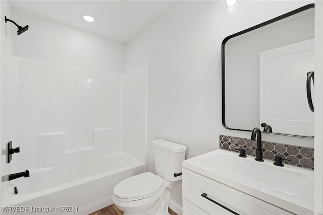 full bathroom with vanity, toilet, and shower / bath combination